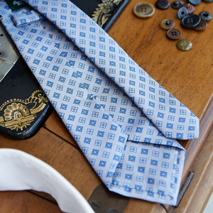 
                  
                    Fantasy tie in gray pure silk with light blue micro pattern
                  
                