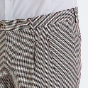 
                  
                    2 pleats trousers in houndstooth wool blend
                  
                
